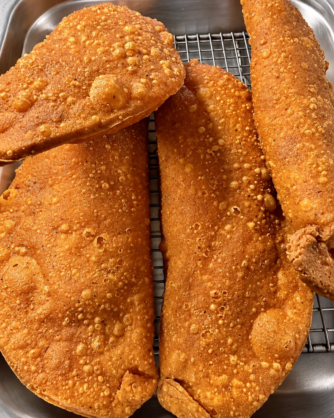 Crisp orange Ilocos empanadas